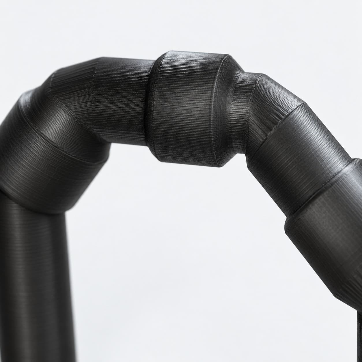 Lily Pipe Outflow Single, Eheim 12/16mm, Replacement, Black, close up of the printed surface