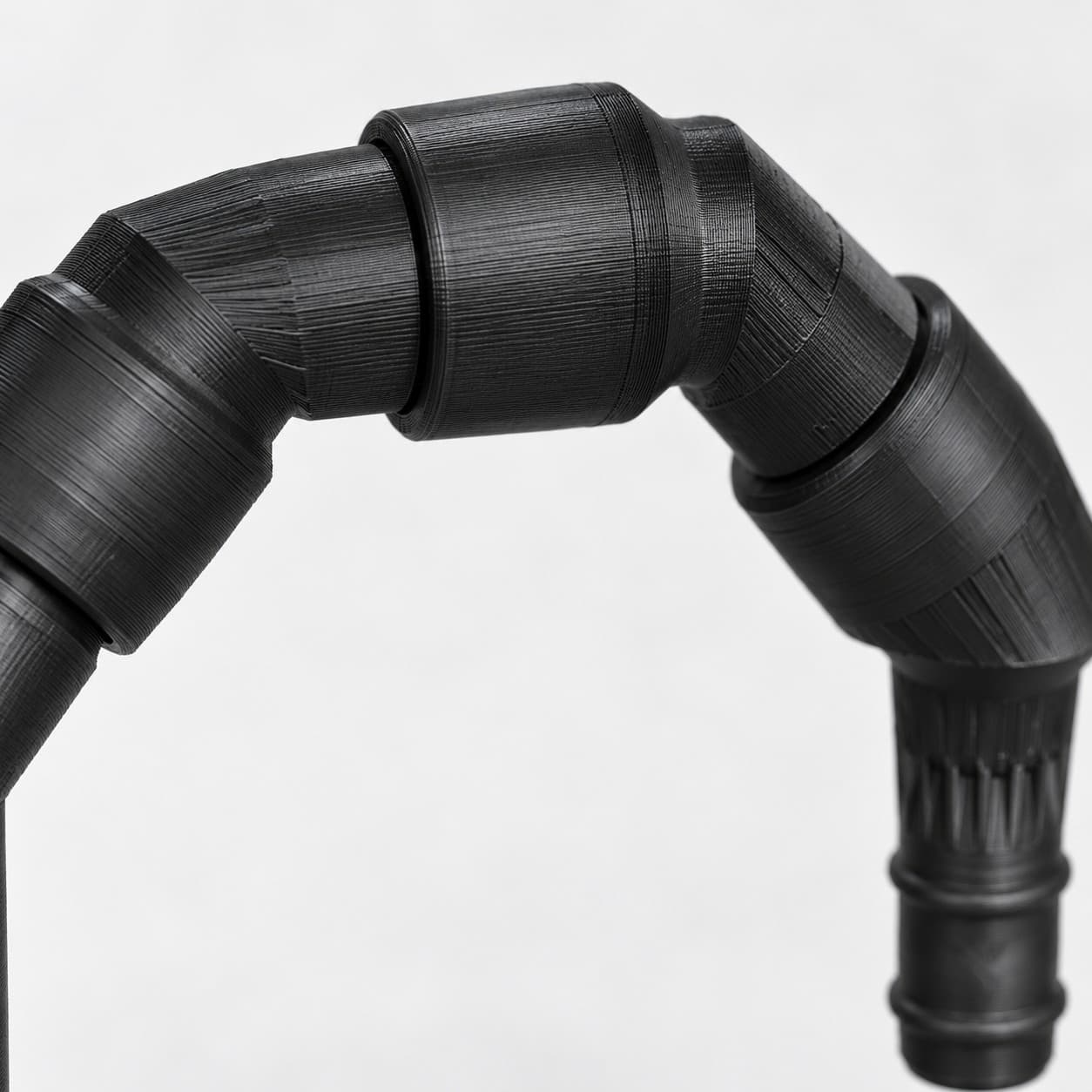 Lily Pipe Inflow + Outflow Pair, Eheim 12/16mm, Black, close up of the printed surface