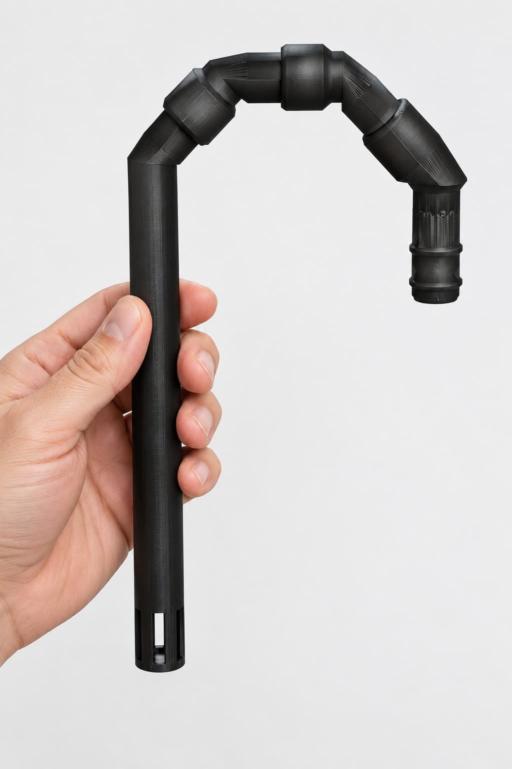 Lily Pipe Inflow Single, Eheim 16/22mm, Replacement, Black, held in a hand to show its size