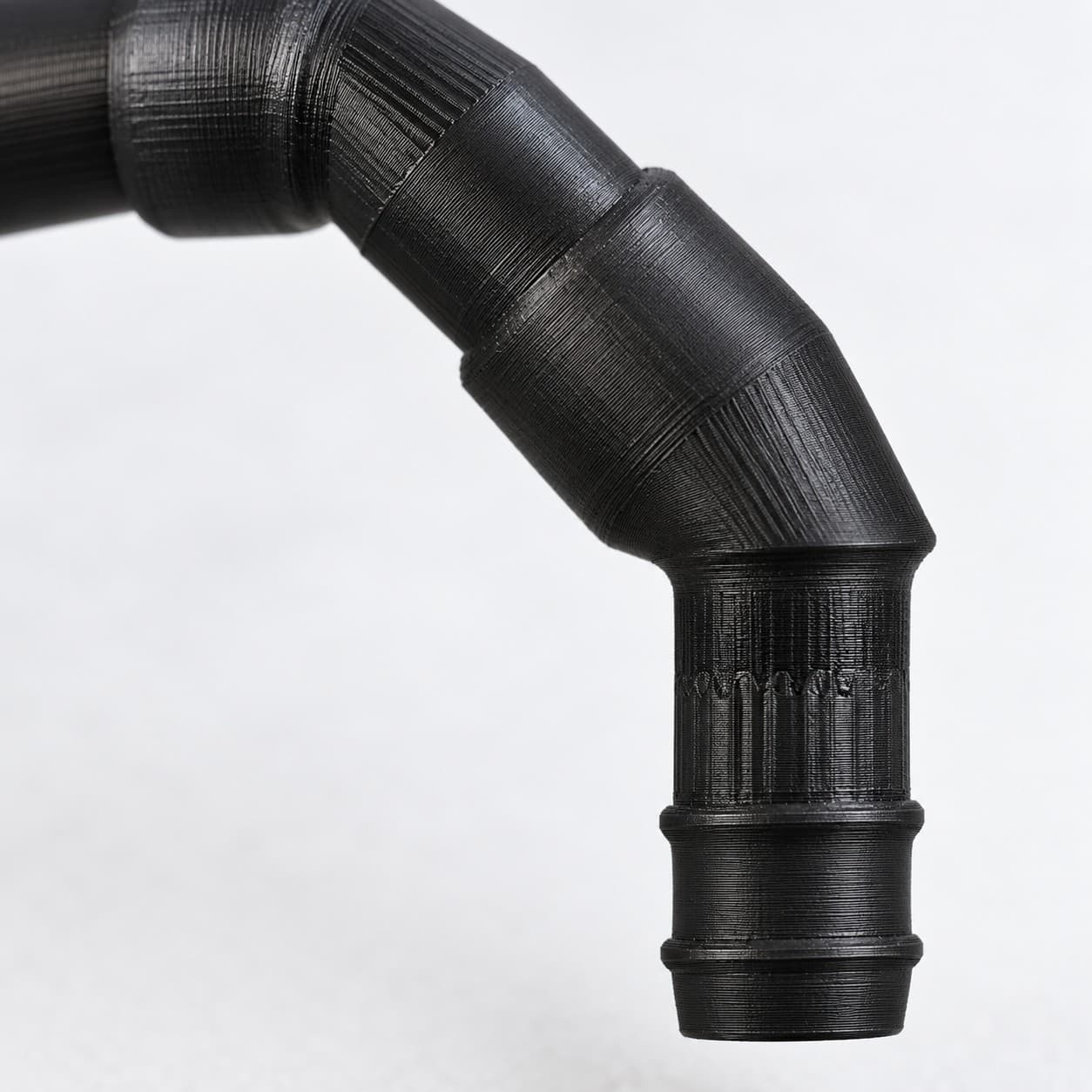 Lily Pipe Outflow Single, Eheim 16/22mm, Replacement, Black, close up of the printed surface